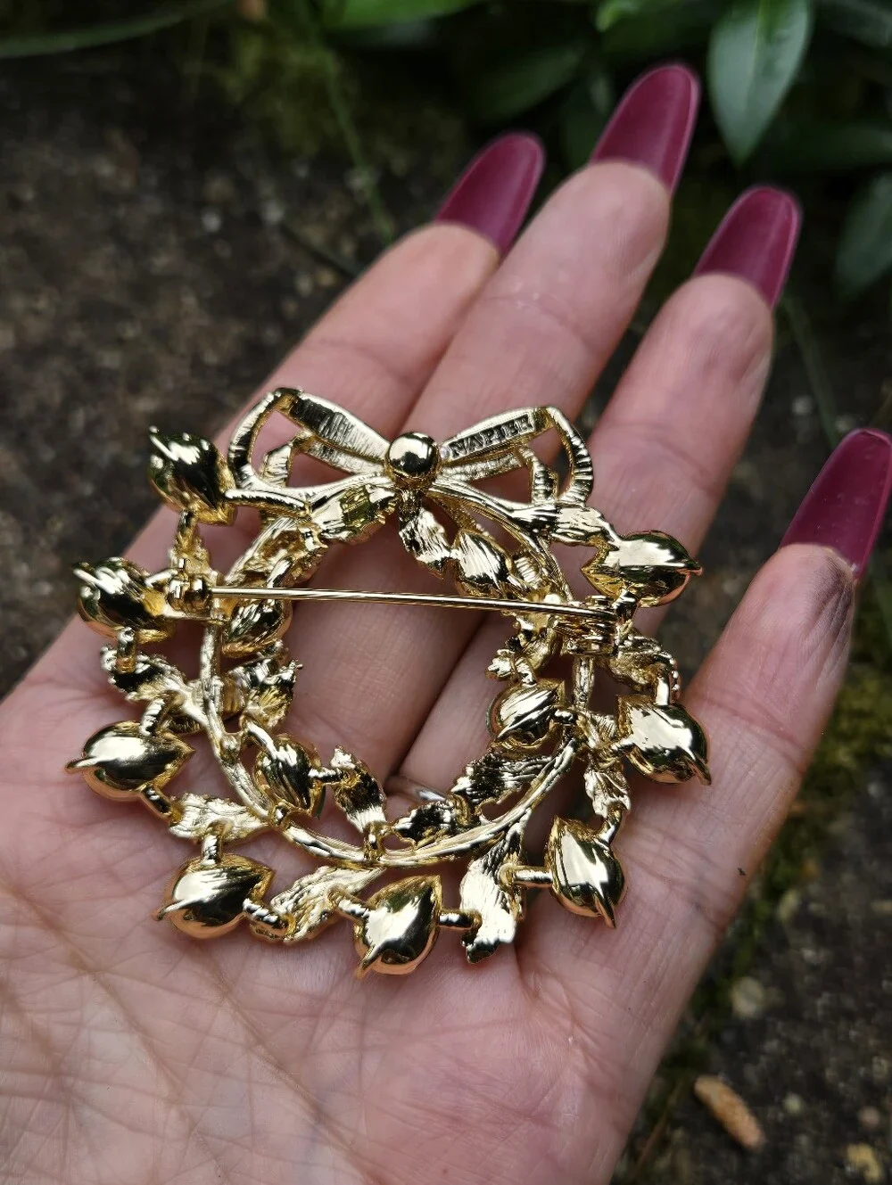 Napier Gold Tone Wreath Brooch with Emerald Green Stones
